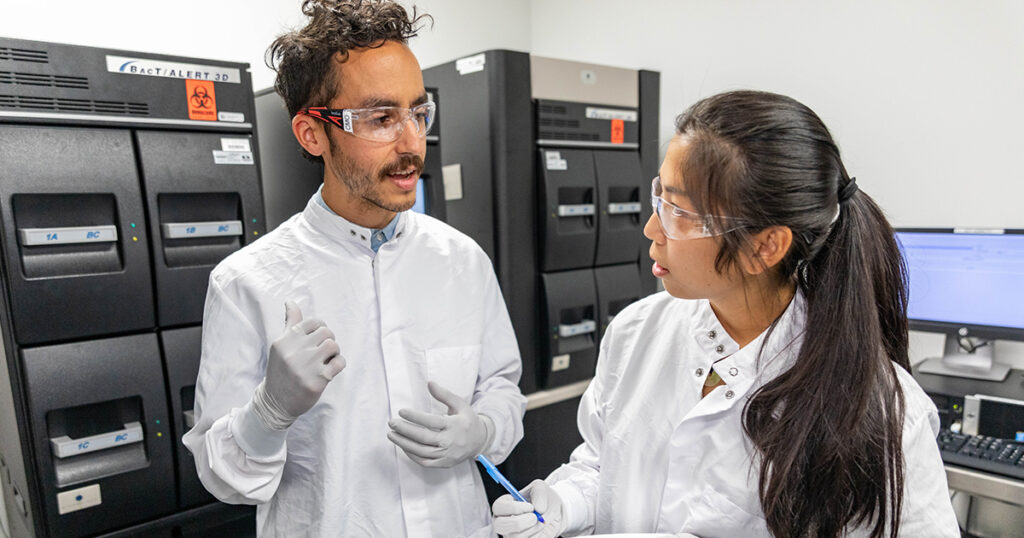 Photo of two colleagues working in cell therapy