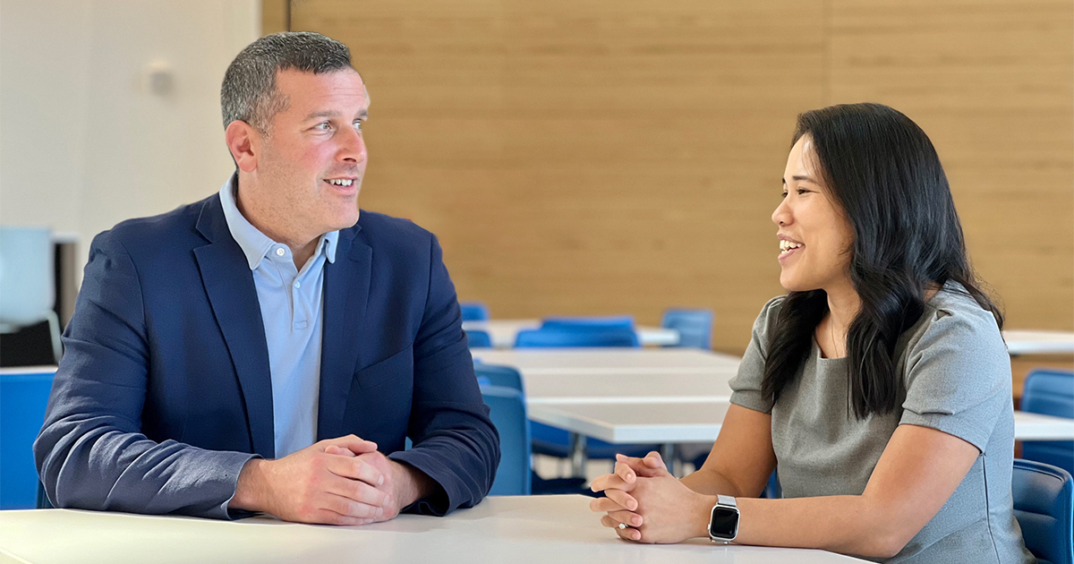 Photo of Irene and Andrew in conversation