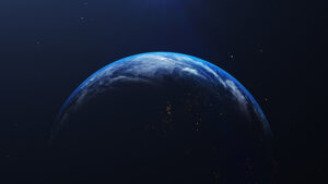 Earth in space view with shining sunrise in universe and galaxy 